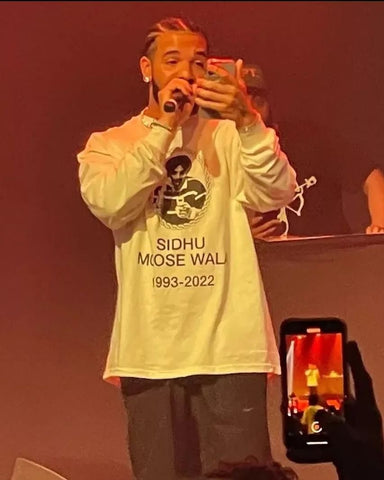 Drake pays tribute to Sidhu Moose Wala in Canada Concert - Wears Full Sleeves White T-Shirt with SMW's photo on it