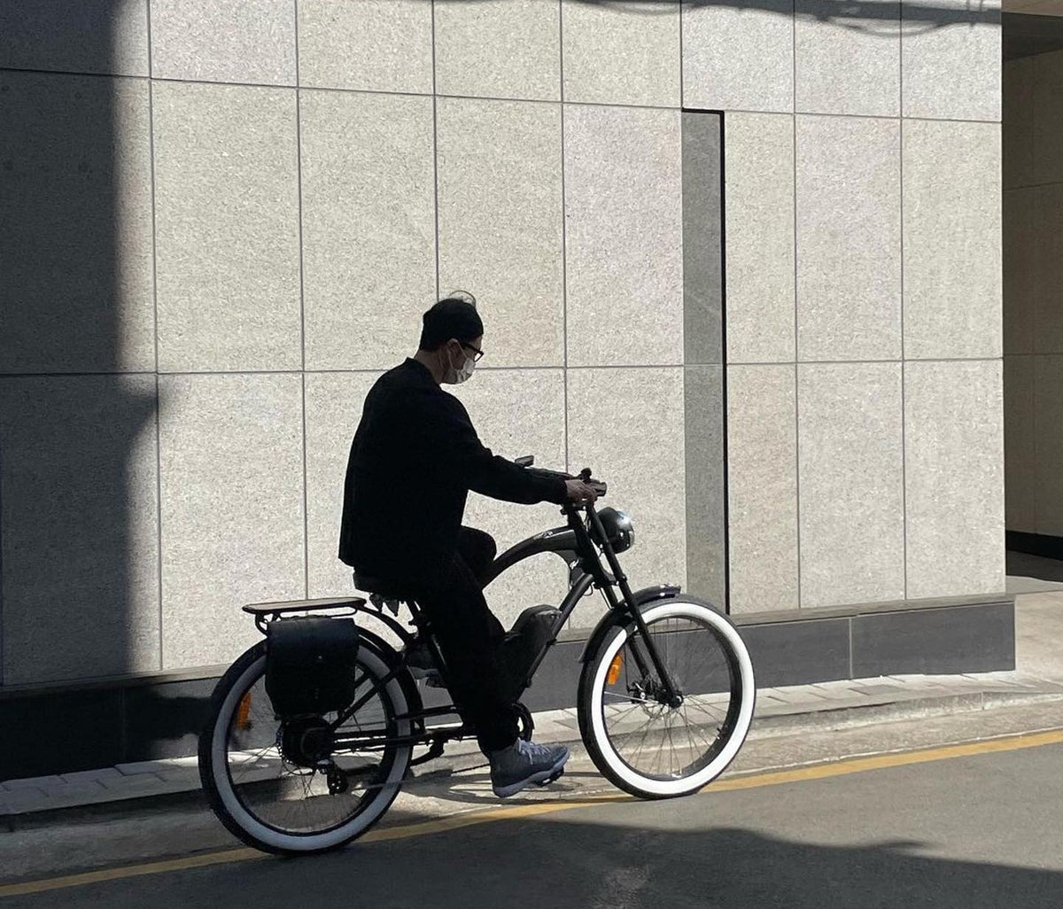 Man riding mid-drive Michael Blast eBike outside