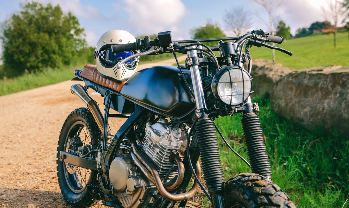 Scrambler motorcycle on dirt path