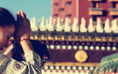 In Buddhism, the color red is a symbol of life force, compassion, and rules the tongue. Wearing the red string in Buddhism is a reminder to the wearer to show compassion to all and mind the tongue; for the tongue can cut deeper than the sword.