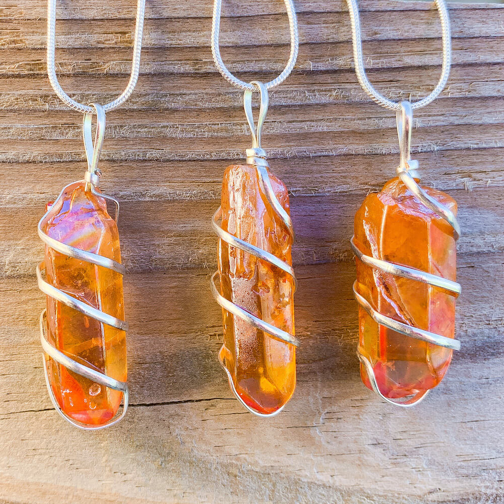Looking for Tangerine Aura Quartz Crystal Point? Shop at Magic Crystals for a variety of Aura Quartz Crystal Rose Jewelry. Aura Quartz Crystal point. Raw Rose Aura Quartz Crystal Necklace, Healing Gemstone, Rose Aura Quartz Pendant. Raw Crystal Point Pendant Necklace, Wrap Necklace for Men Women