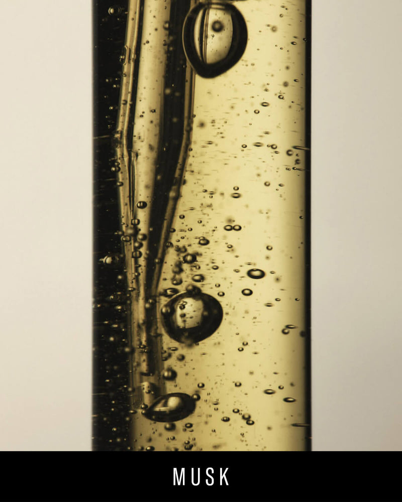 Close up of a Musk in a tube with the words "Musk" at the bottom.