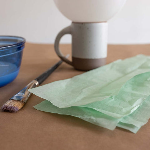 Reuse tissue paper for recycled Earth Day crafts paper mache