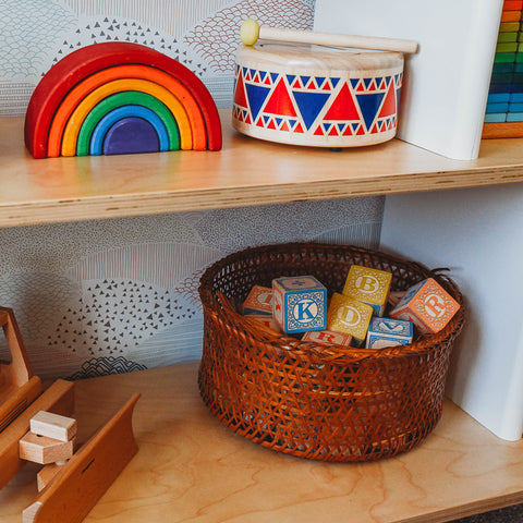 Uncle Goose Blocks in a basket in a toy rotation.