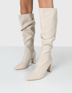 beige calf high boots