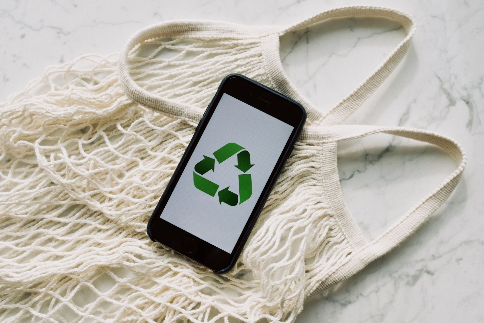 Keep Australia Beautiful Week recycling symbol and reusable bag