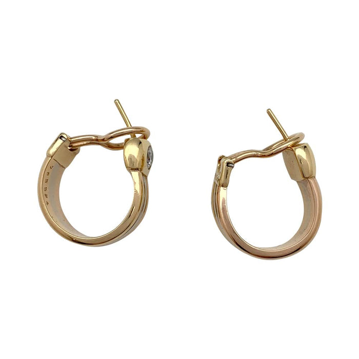 Cartier "Fogorra" earrings in three tones of gold, diamond.