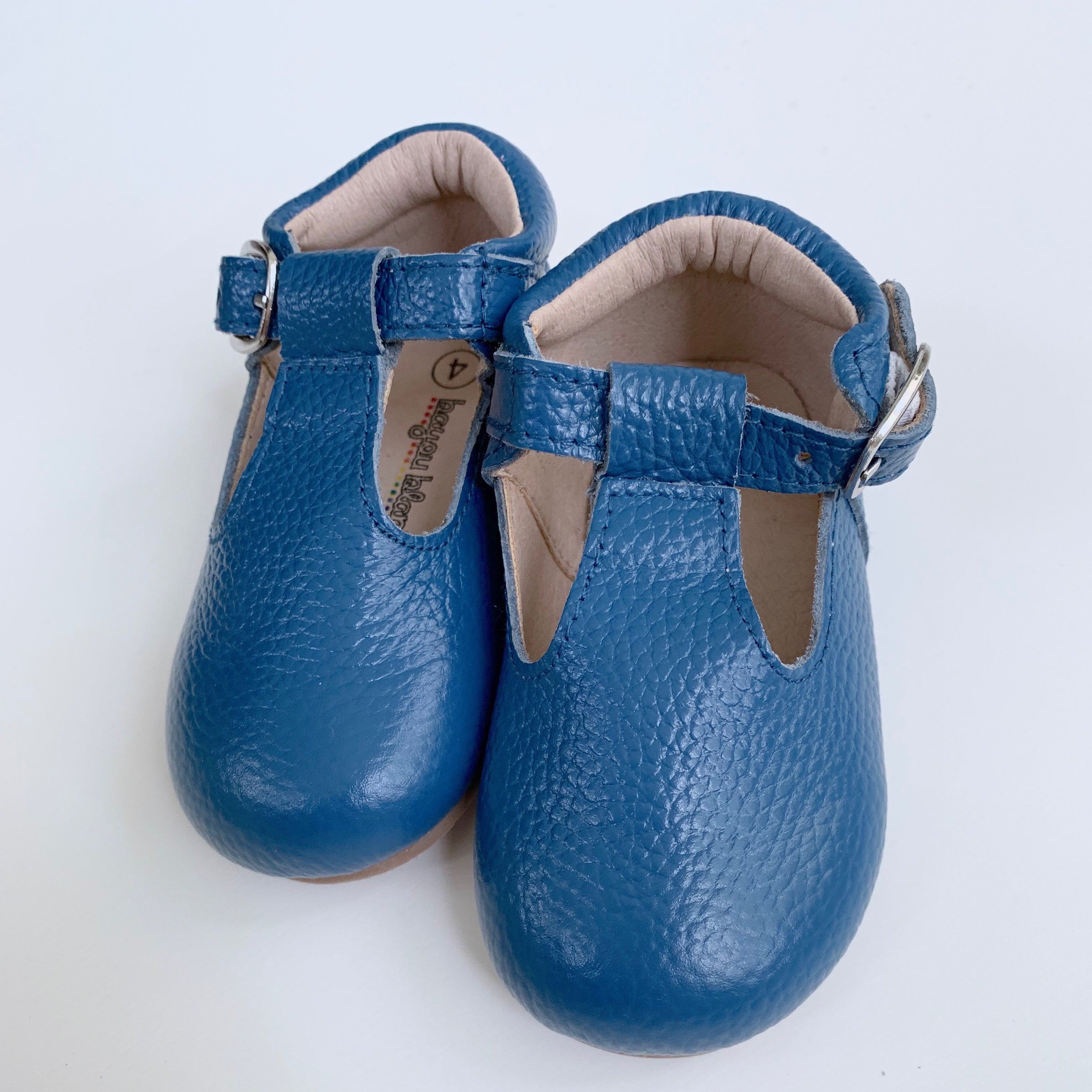 blue t strap shoes