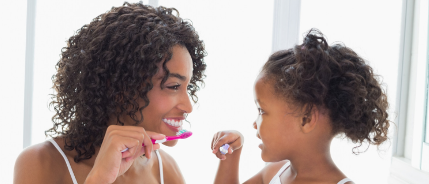 Mum and Daughter brushing