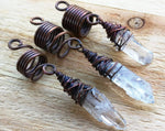 Set of 3 crystal dread beads displayed on a wood background