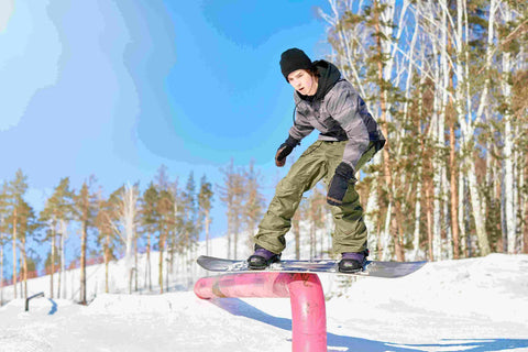 Snowboarder on a rail