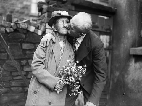 Old Couple In Love Kissing 