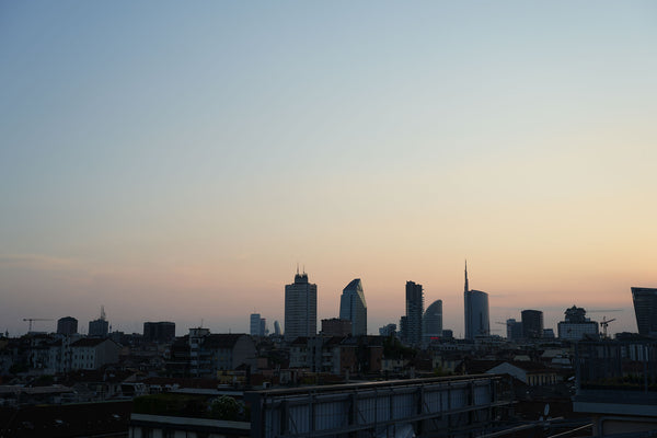 A cityscape at dusk.