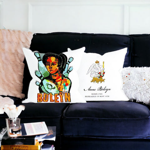 Anne Boleyn Pillow front and back on blue velvet sofa