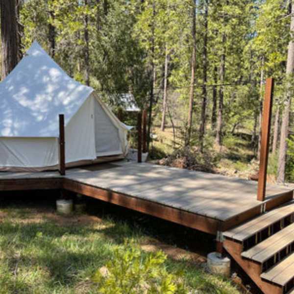 wood bell tent deck with tent on it