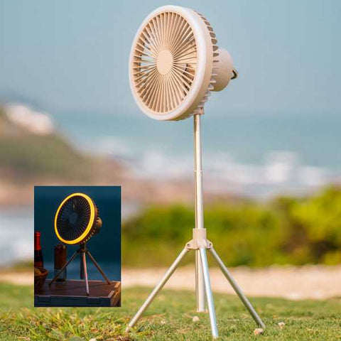 tall camping fan showing a light place on the grass