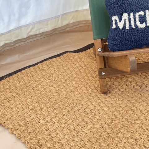 Coir coconut husk tent rug mat in a bell tent