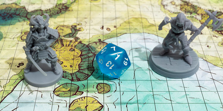 board game with a rolling die and two detailed miniatures