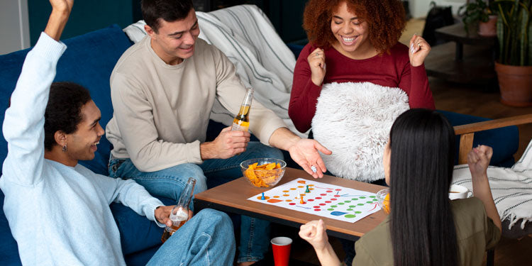 group of friends playing board games, everyone is happy