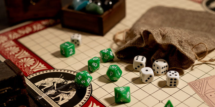 rolling dice and other accessories placed on top of a playing board