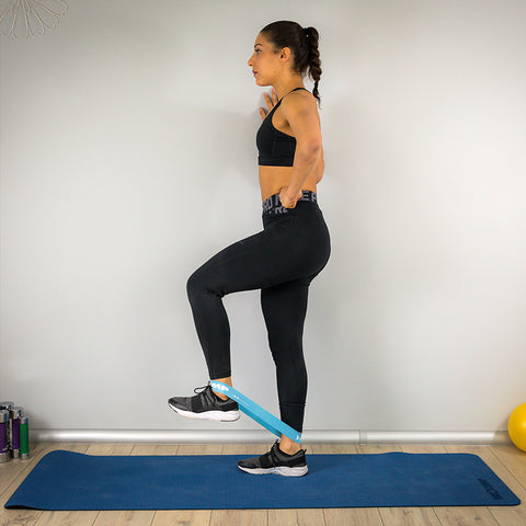 Theraband leg stretches while standing Starting position