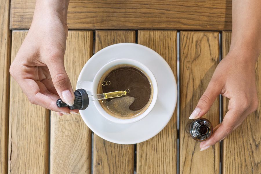 CBD oil being added on coffee
