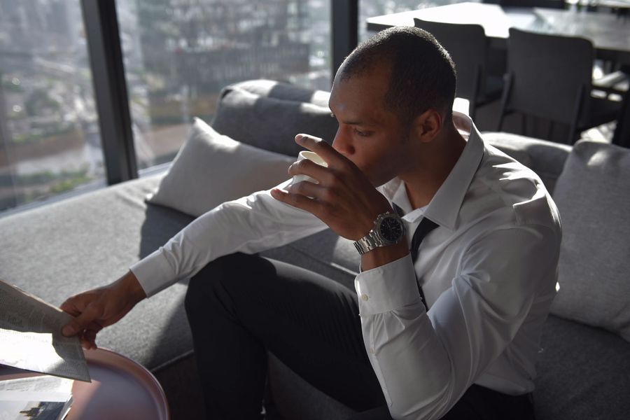 Man drinking his CBD infused coffee