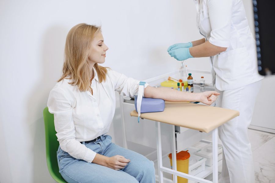 Woman having her blood taken for a test