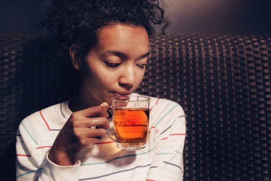 Woman holding a cup of tea