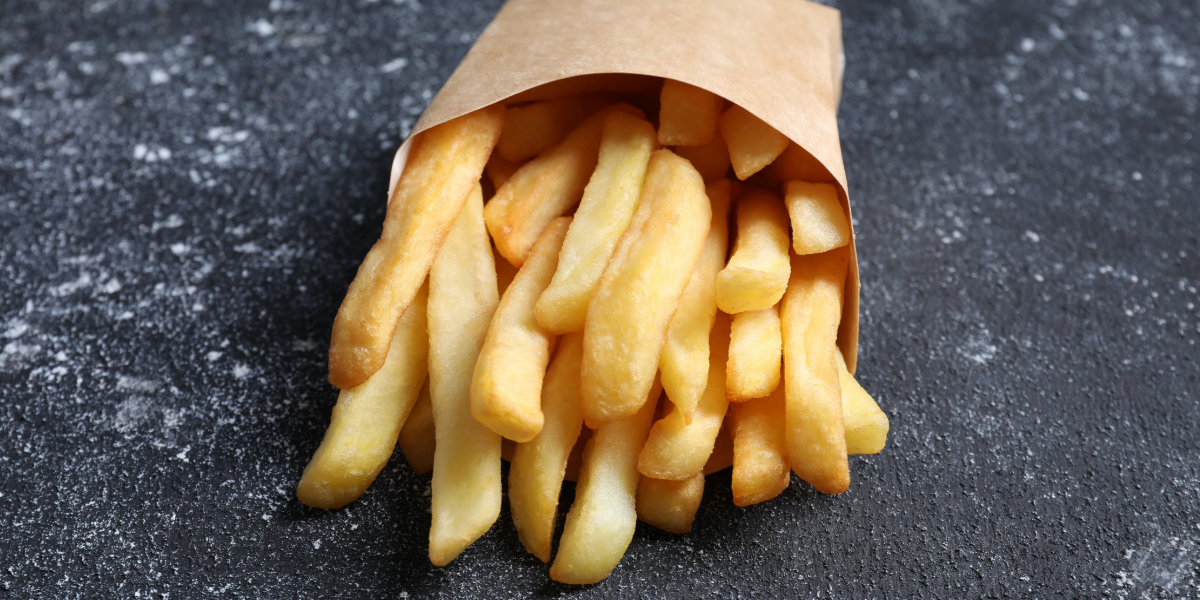 Hot fries in a takeaway box