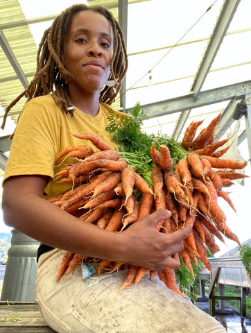Amber Tamm Urban Farmer with carrots
