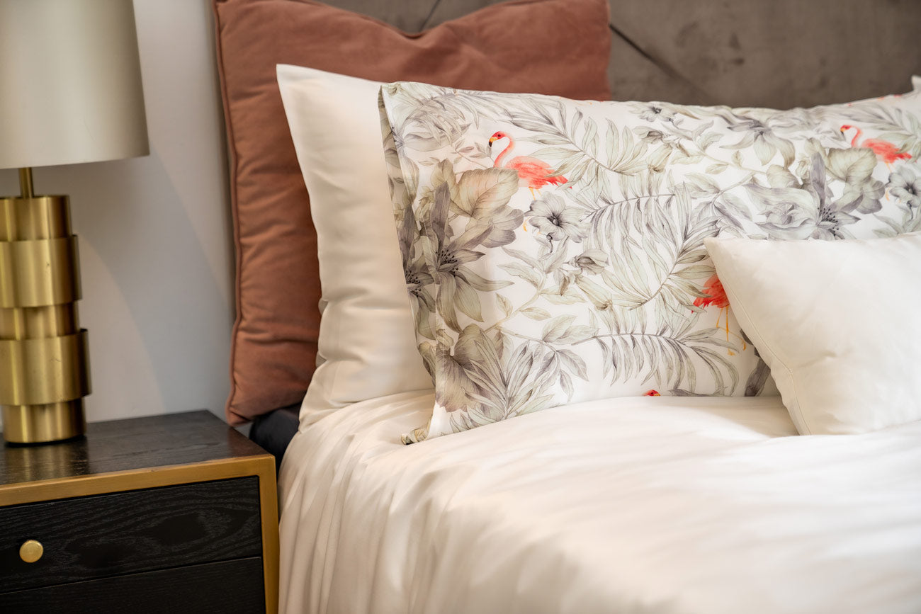 Flamingos silk pillowcase on dressed luxury bed - Mayfairsilk