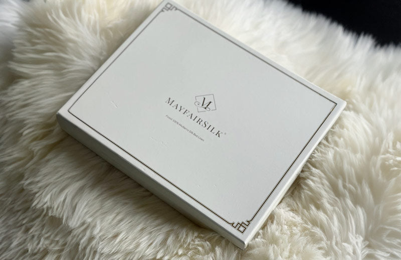 Mulberry silk bedding gift box on woolen rug - Mayfairsilk