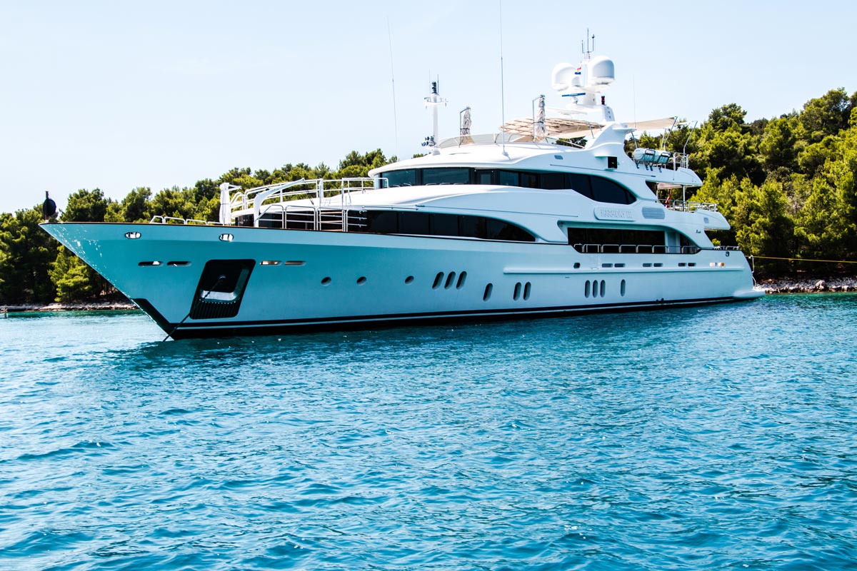 Superyacht in the harbour with silk bed sheets