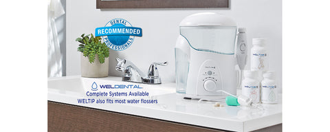 water flosser on bathroom counter