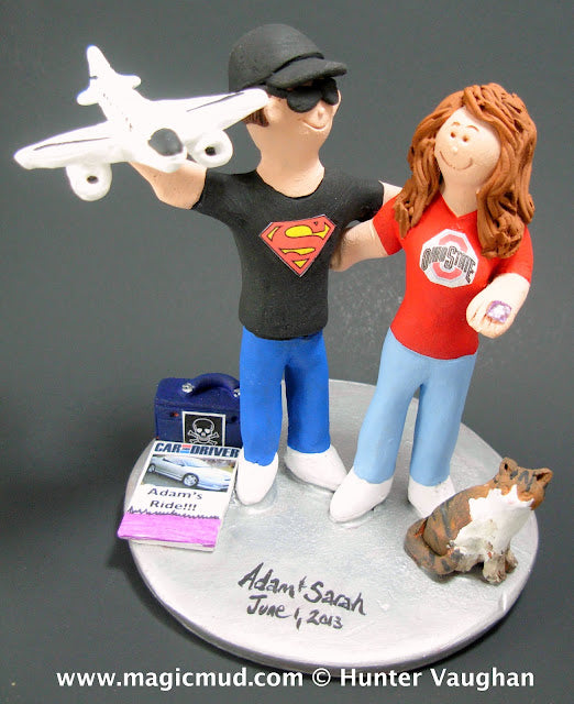 superman and ohio state grad wedding cake topper