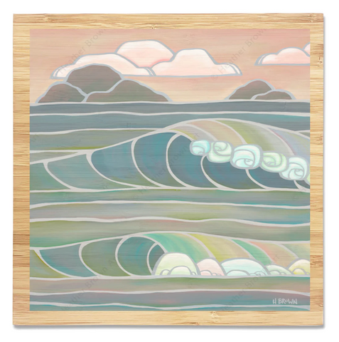 heather brown surf bamboo art print of twilight paradise a pastel piece showing breaking waves in the foreground with small islands in the background