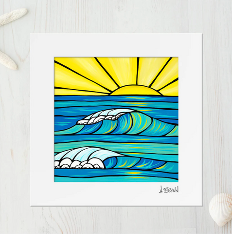 art print of crashing waves in the forefront of a beautiful Hawaiian Sunrise by Heather Brown from the north shore of Oahu