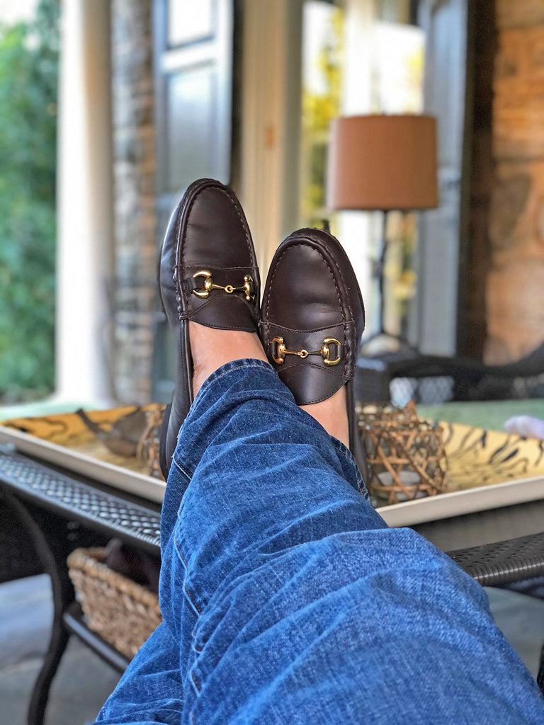 brown bit loafers on table - will cyphers in their shoes