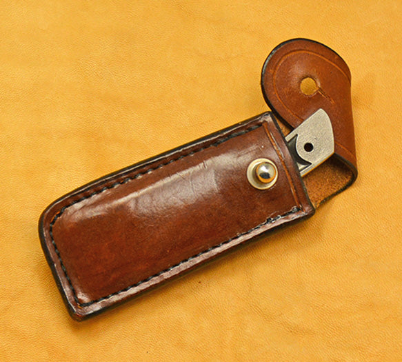 Boye Cobalt Sub-Basic with Brass-lined Leather Sheath.