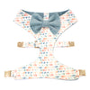 Reversible dog harness in multi-color dot print with blue velvet bow tie