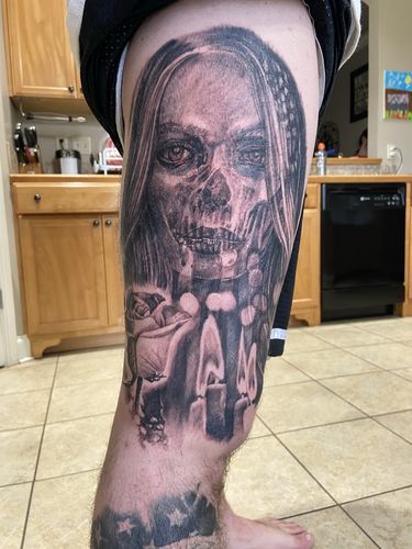 female grim reaper thigh tattoo