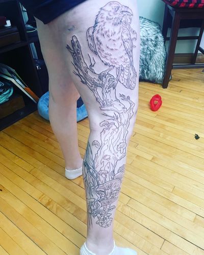 raven on tree full outer leg tattoo