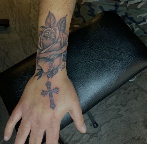 rose and cross tattoo