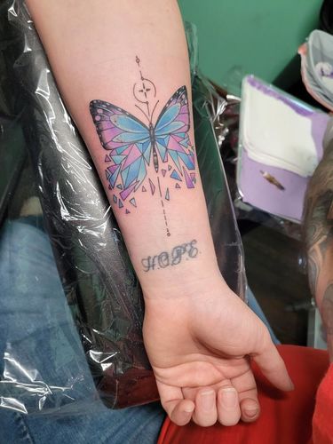geometric butterfly tattoo