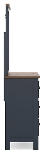 Landocken Twin Panel Bed with Storage, Accompanied by a Mirrored Dresser and Chest