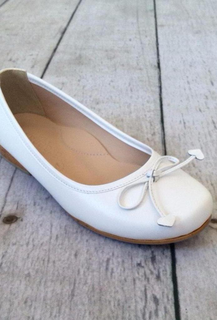 white flat communion shoes