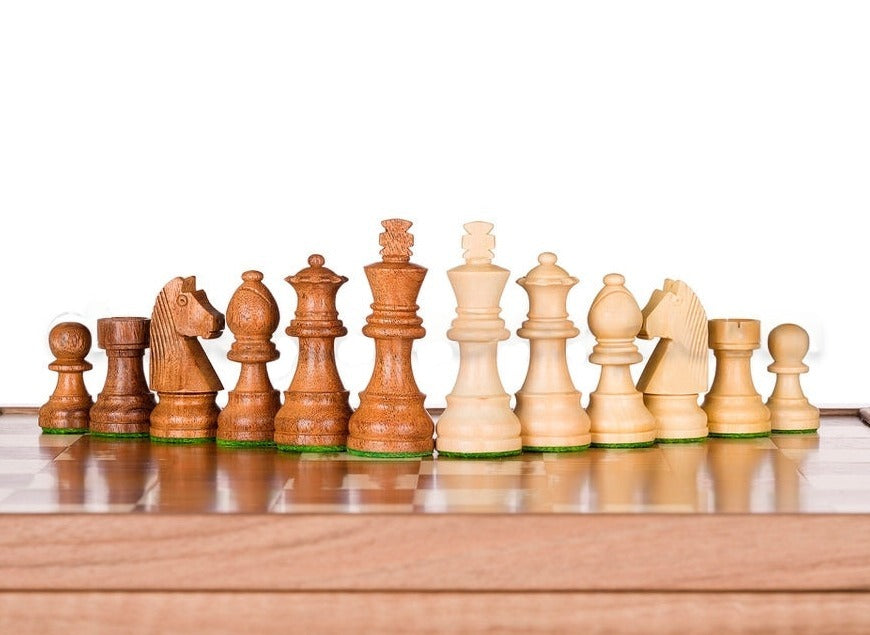 Hand-carved chess pieces in sesham
