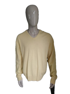 Steppin out wool sweater. Light yellow colored. Size XL