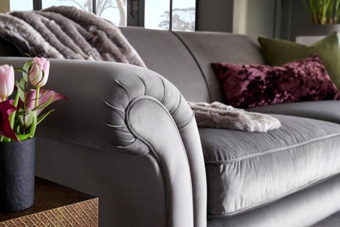 Steel colored velvet sofa